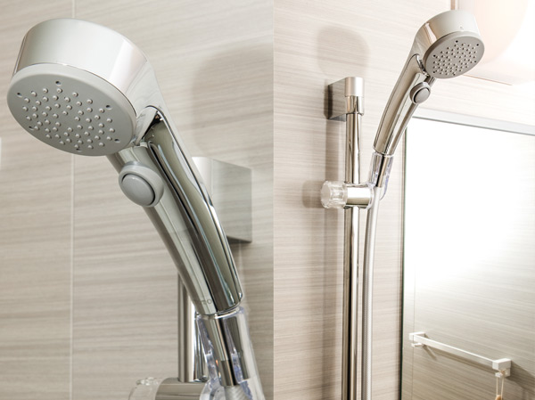 Bathing-wash room.  [Click shower and slide shower hook] Slide shower hook and hand in a shower of water stop and the water discharge that can adjust the height of your choice has adopted a one-push shower that can be manipulated.