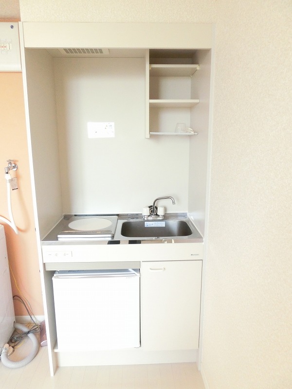 Kitchen. A kitchen with a mini-fridge