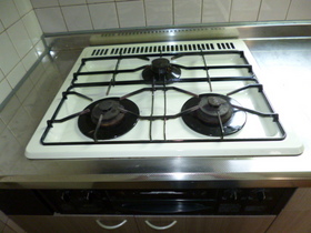 Other Equipment. Happy three-necked gas is with a stove grill