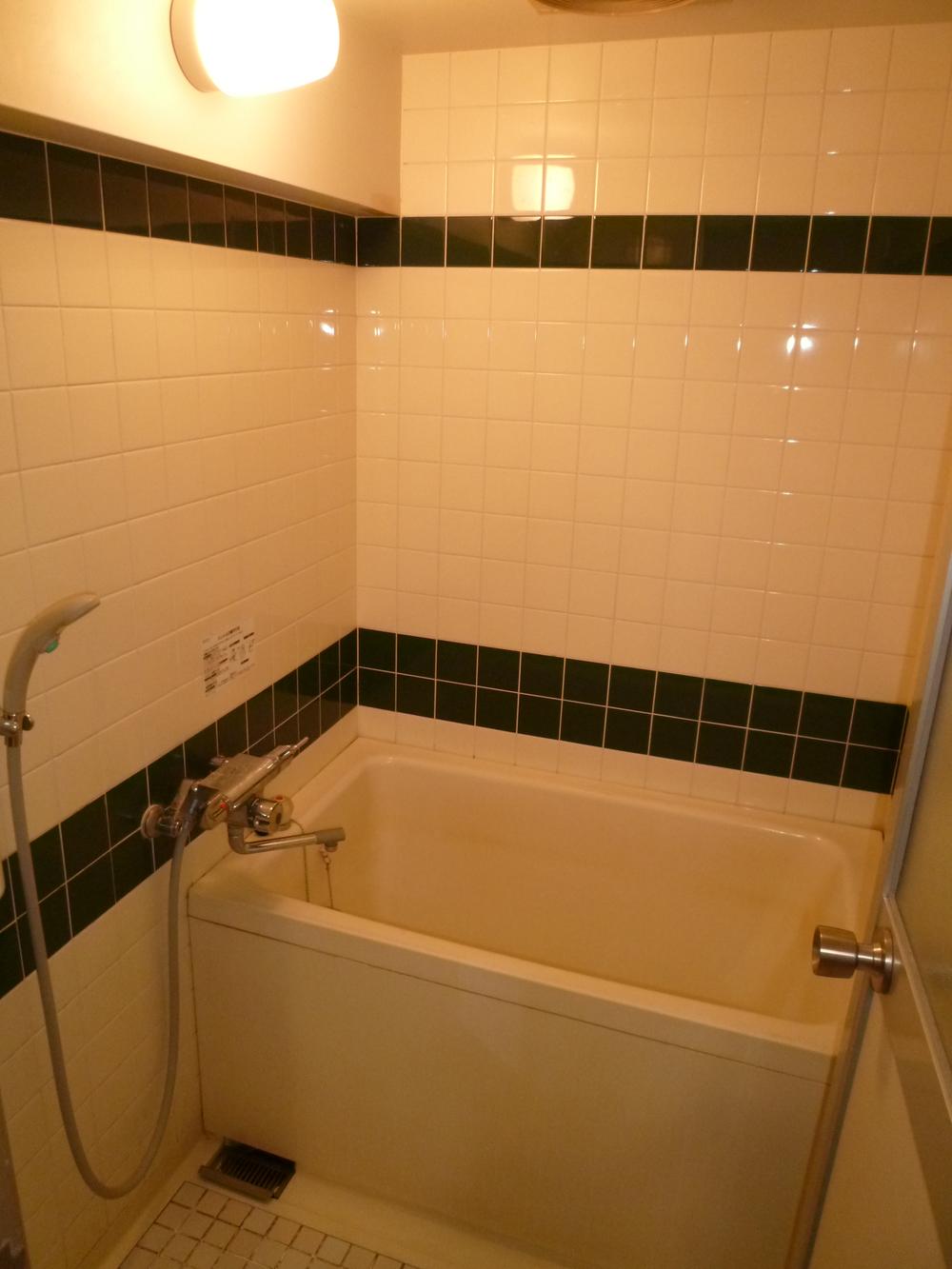 Bathroom. Shower with bathroom (tile tone)
