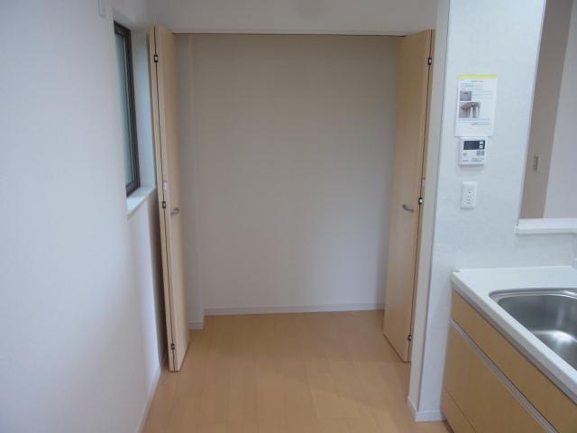 Kitchen. Also housed next to the kitchen! It can also be used as a pantry!