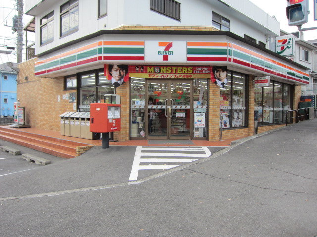 Convenience store. Seven-Eleven Nishigaoka store up (convenience store) 421m