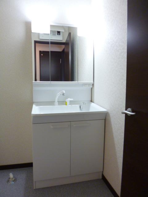 Wash basin, toilet. Building 2 washroom