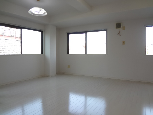Other room space. The window is large bright rooms