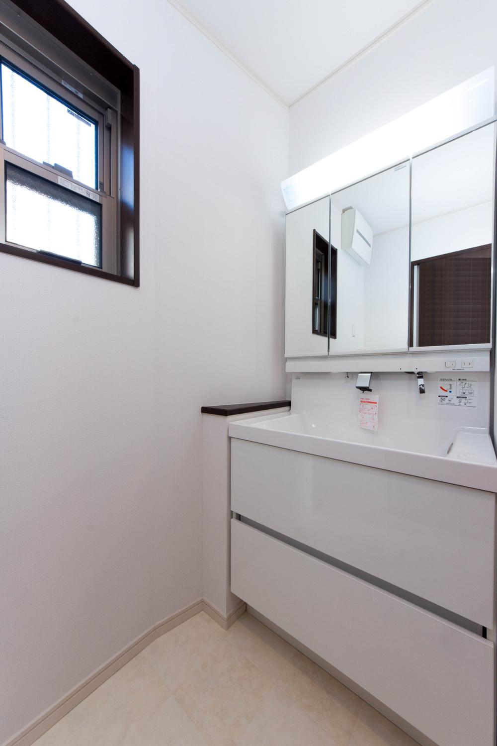 Wash basin, toilet. Vanity integrally molded counter