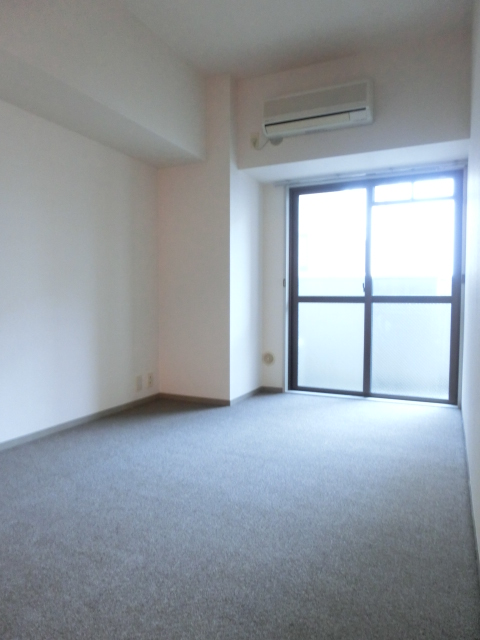 Other room space. The living room carpet