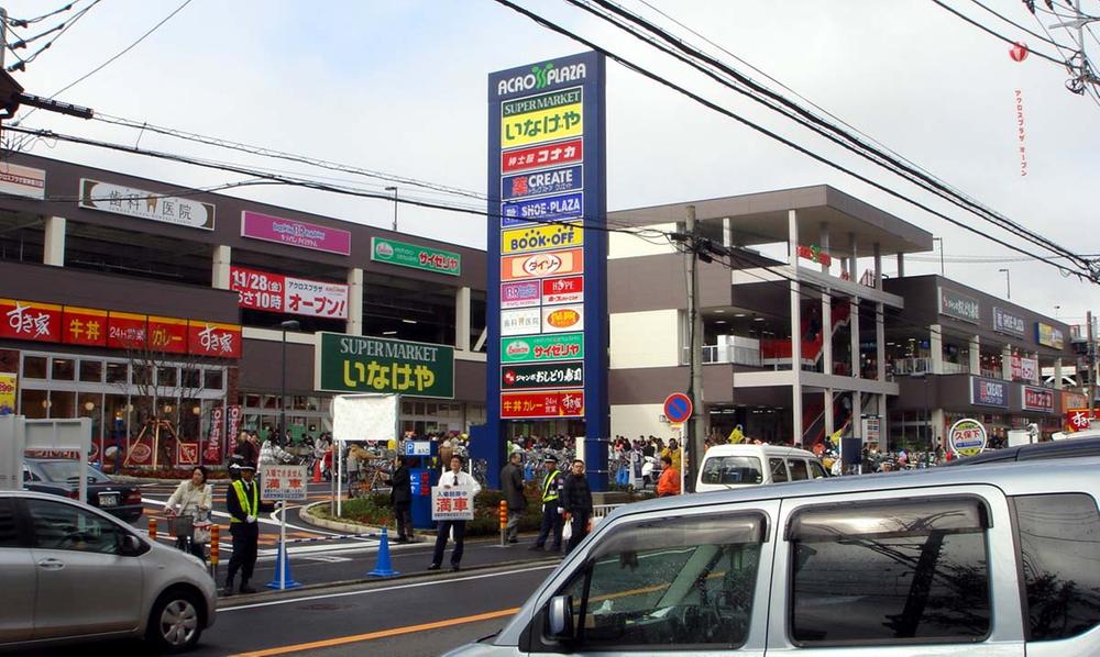Shopping centre. Across Plaza to Higashi Kanagawa 2400m