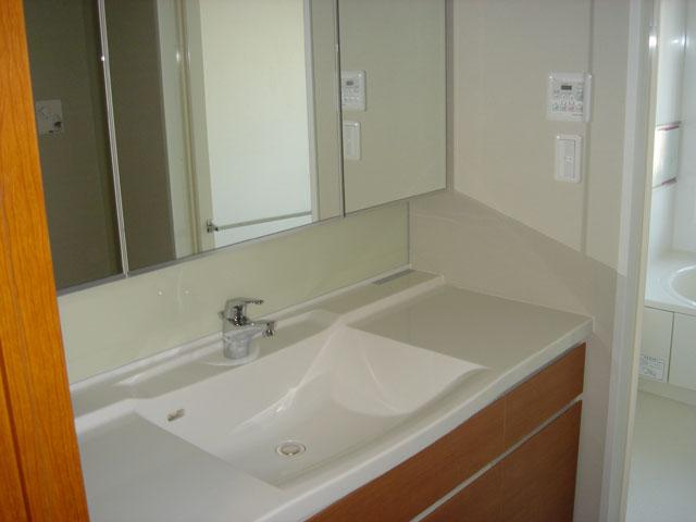 Wash basin, toilet. Bathroom vanity