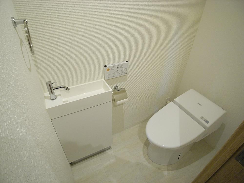 Toilet. Popular tankless type. It is very fashionable toilet. Indoor (10 May 2013) Shooting