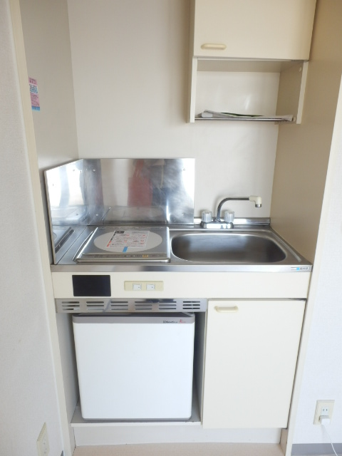 Kitchen. It is with a mini fridge. IH stove!