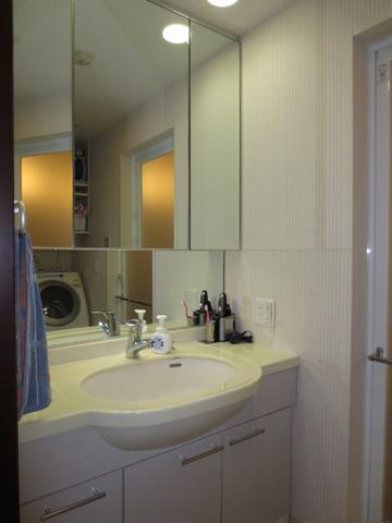 Wash basin, toilet. It is vanity triple mirror type. Behind the Mirror is housed.