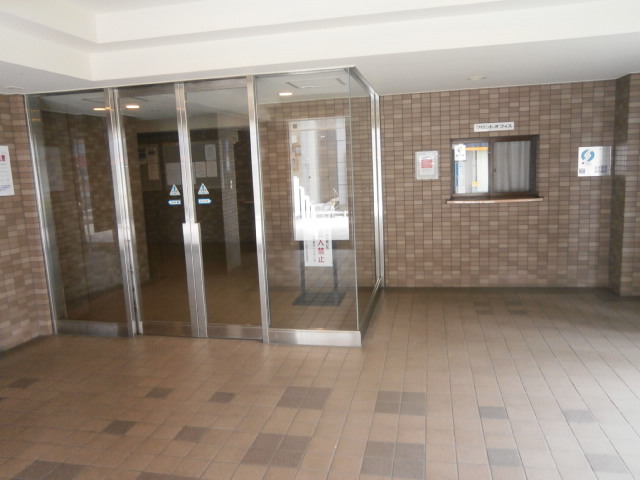 Entrance. Auto-lock and management person room