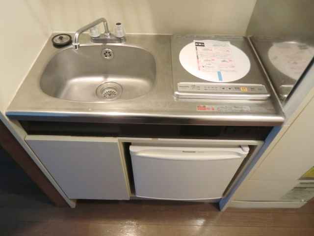 Kitchen. A kitchen with a mini fridge