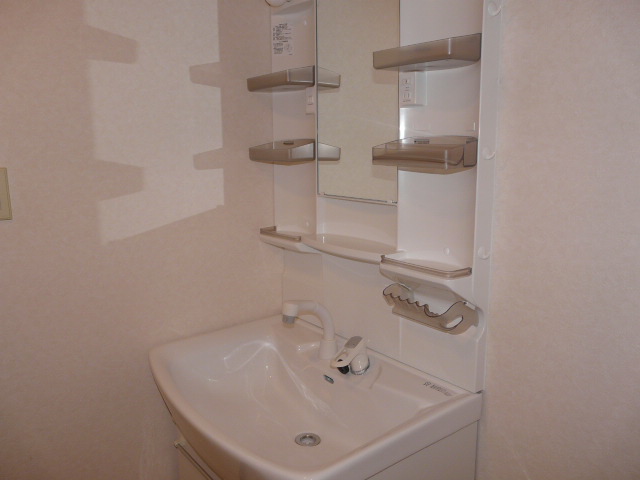 Washroom. With separate wash basin
