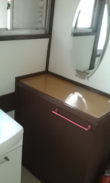Washroom. A large mirror with ☆