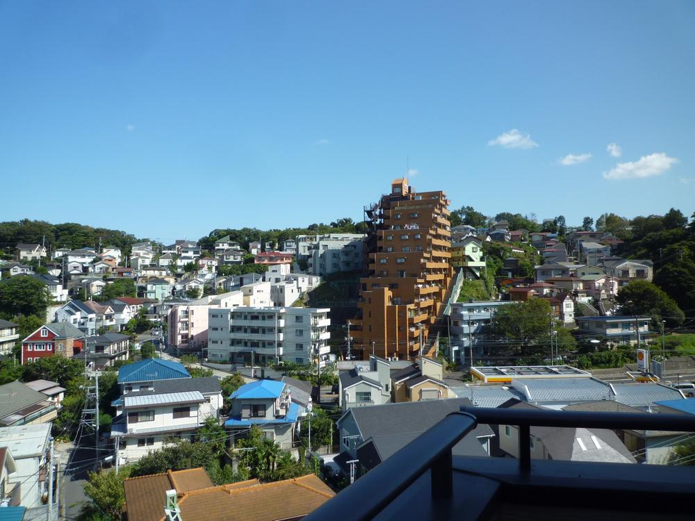 View photos from the dwelling unit. It is a beautiful view of the more overlooking the rooftops. 