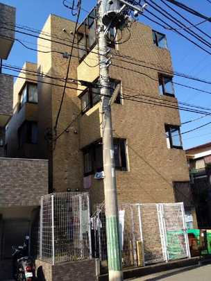 Local appearance photo. Building exterior photo. It is the outer wall of the bright tiled.