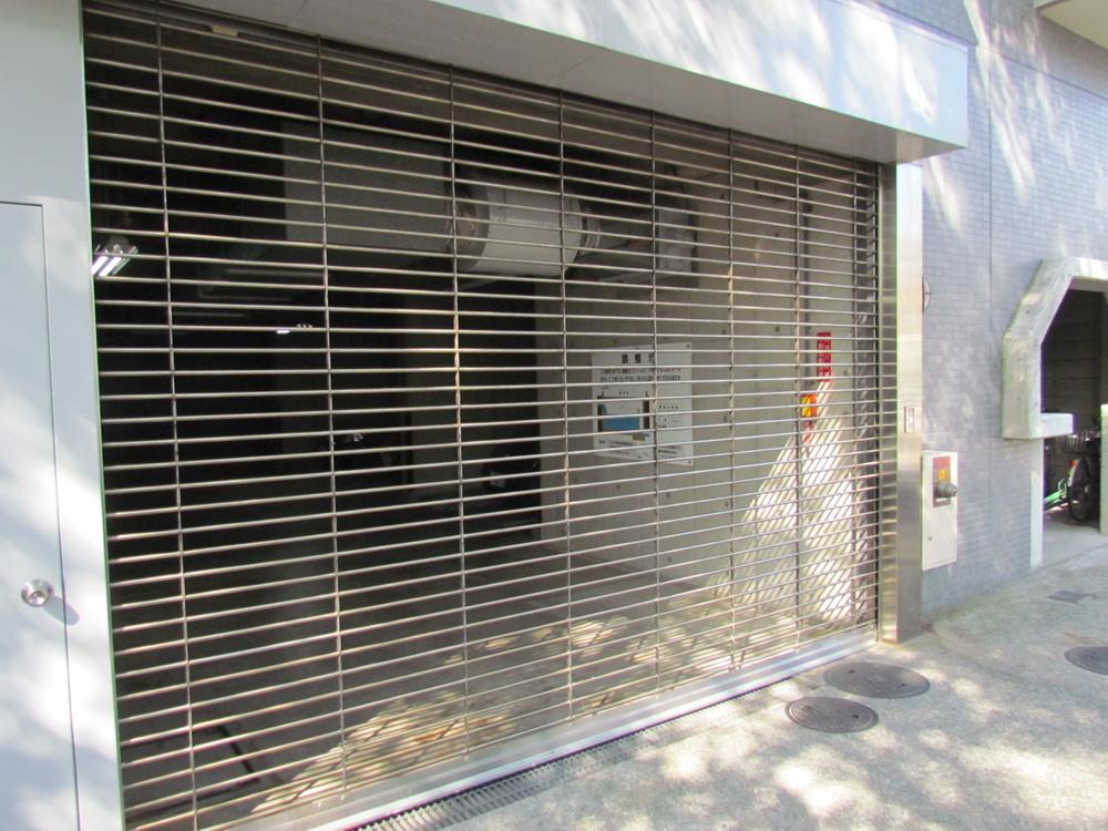 Parking lot. Crime prevention measures thorough of parking with a shutter