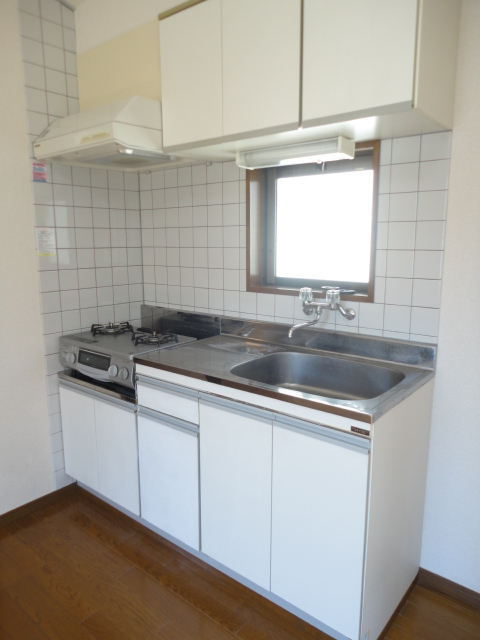 Kitchen. The spacious kitchen is easier than ever with the dishes