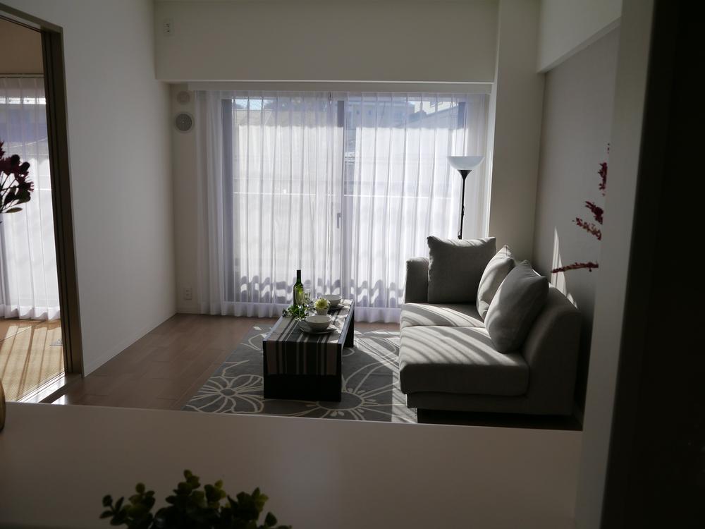 Living. Living as viewed from the kitchen