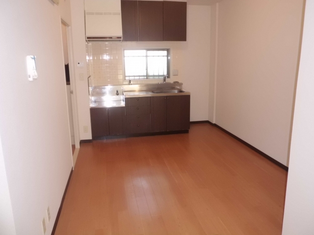 Living and room. There are also windows in the kitchen