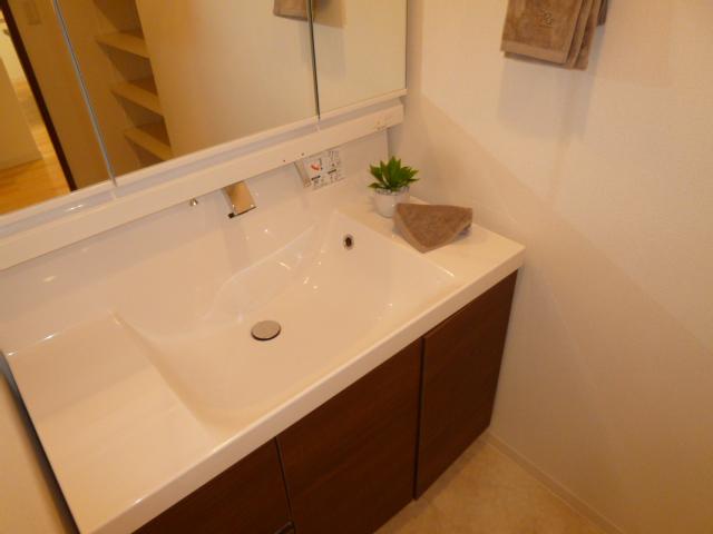 Wash basin, toilet. Bathroom vanity