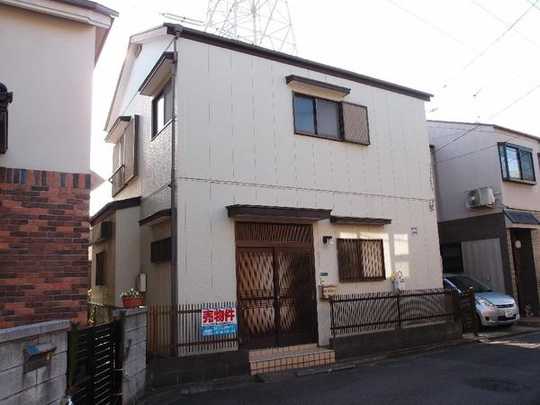 Local appearance photo. Building appearance. It is the easy out in the flat ground.