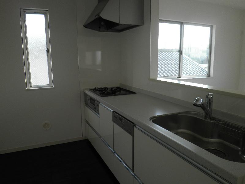 Kitchen. Kitchen with a cupboard hanging behind