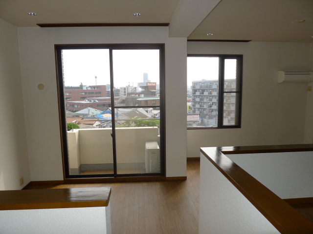 Living and room. The window is large, bright living room
