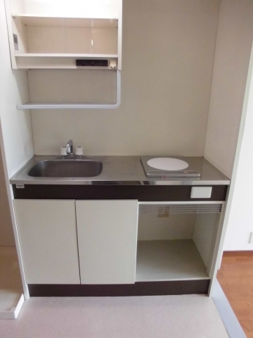 Kitchen. It is a compact kitchen