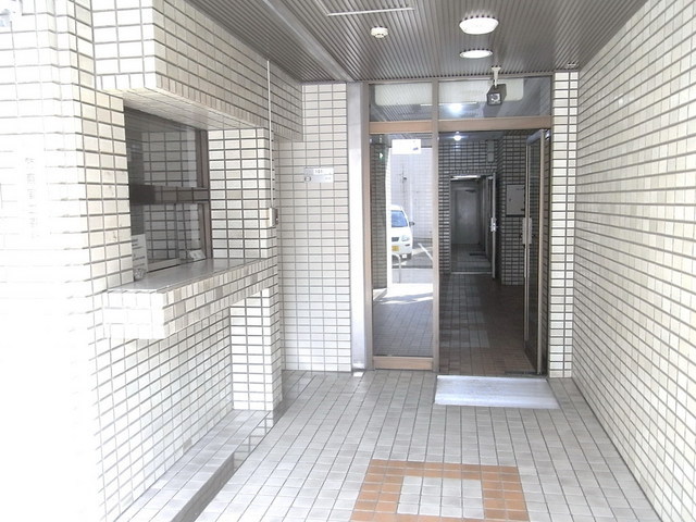 Entrance. It is with a security camera in the caretaker day shift