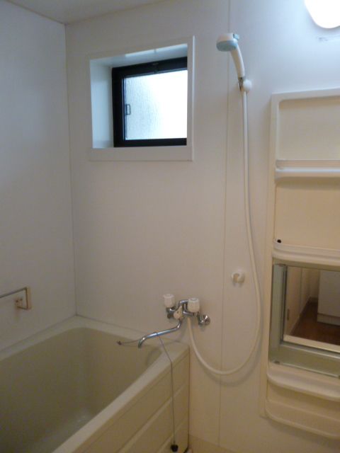 Bath. Small window with! Good ventilation!