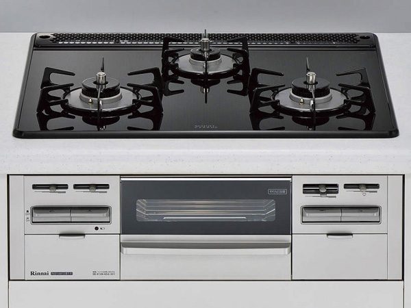 Kitchen.  [A three-neck glass top gas stove] Also quickly one wipe boiled spills and oil stains. Easy to adopt a glass-top stove Care.