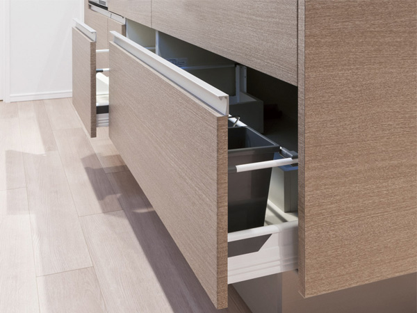 Kitchen.  [Slide storage] At the bottom of the kitchen counter, Adopt the easy access easy to put away sliding storage. With soft-close function.