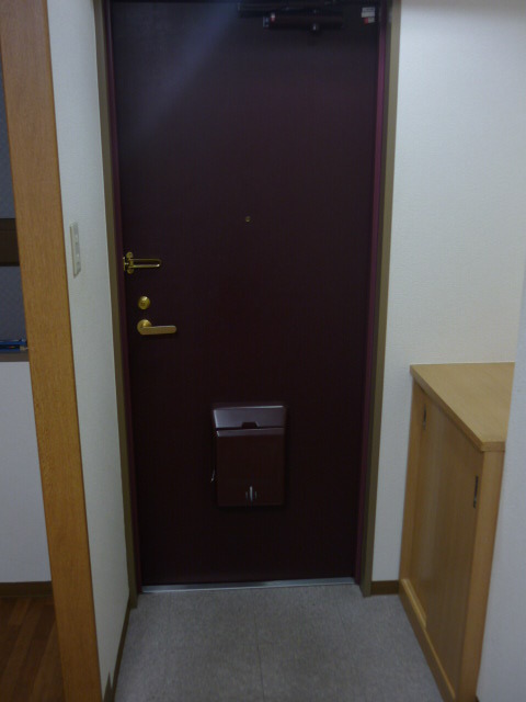 Entrance. There is also a cupboard