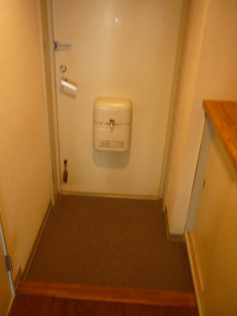 Entrance. With shoe box