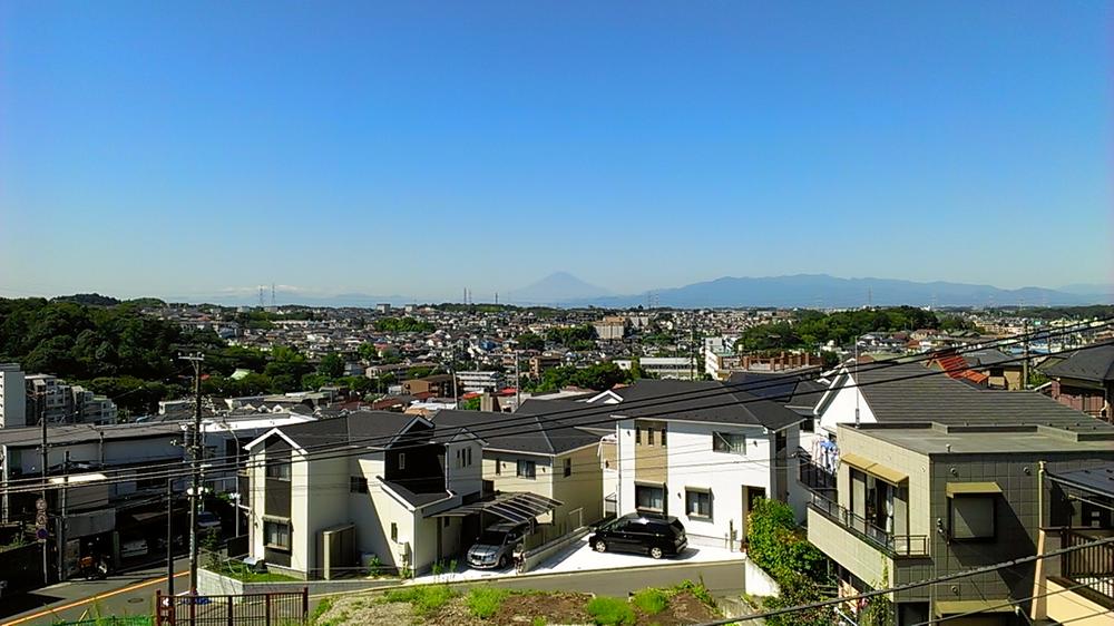 View photos from the dwelling unit. View from the balcony / View is good for the top floor!