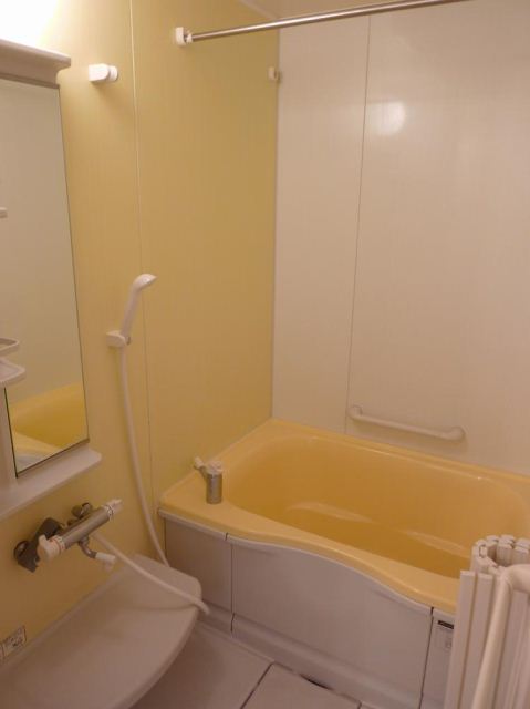Bath. Yellow cute bathroom