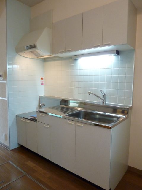 Kitchen. Gas stove installation Allowed, White with a clean kitchen