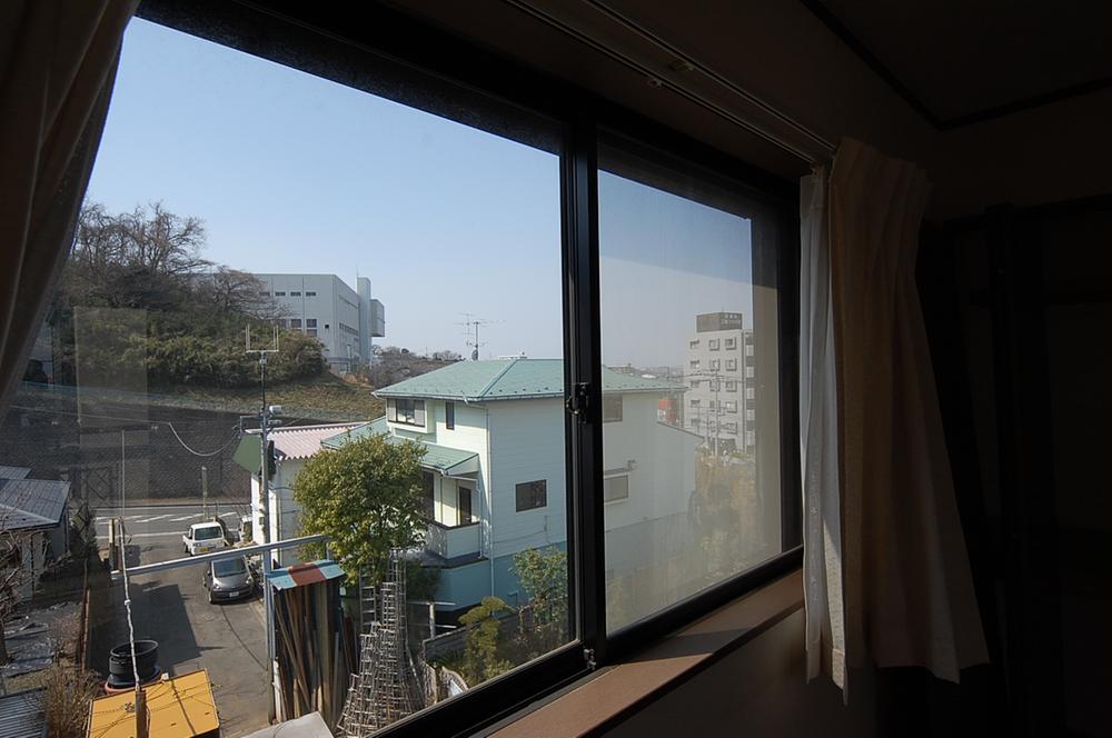 View photos from the dwelling unit. View from the third floor room
