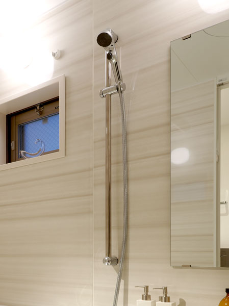 Bathing-wash room.  [One-stop shower] Functional slide bar that allows height adjustment. Adopt a one-stop shower at hand can stop water.