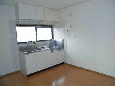 Kitchen. There is a window is bright kitchen.