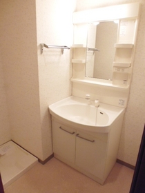 Washroom. Independent wash basin, It is a washing machine inside the dressing room with a yard.