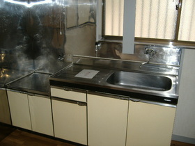 Kitchen. There is a window is light and airy in the kitchen