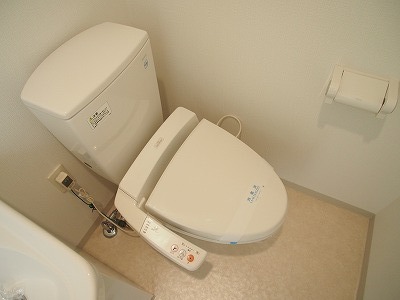Toilet. Washlet with is a picture of the other rooms.