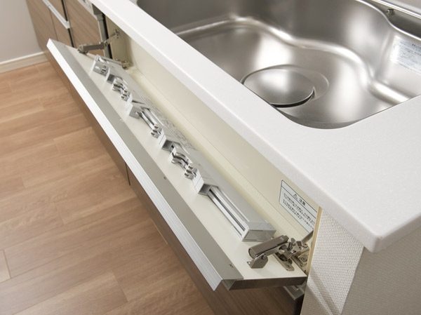 Kitchen.  [Kitchen knife flap storage] Kitchen knife storage lock function is preceded sink. To absorb the shock of when you open the flap, You slowly open.