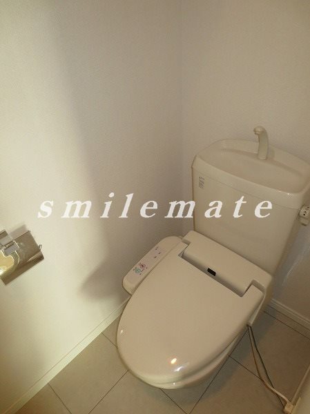 Toilet. The photograph is a reference photograph same by Property Room No.