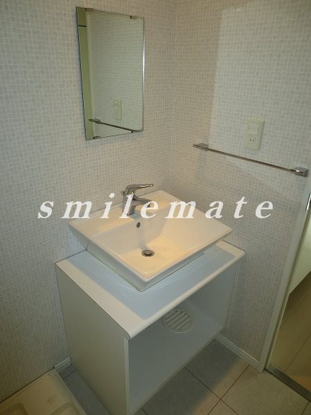 Washroom. The photograph is a reference photograph same by Property Room No.