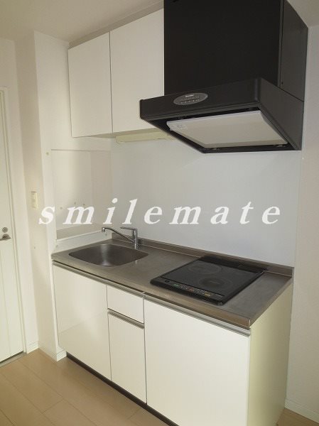 Kitchen. The photograph is a reference photograph same by Property Room No.