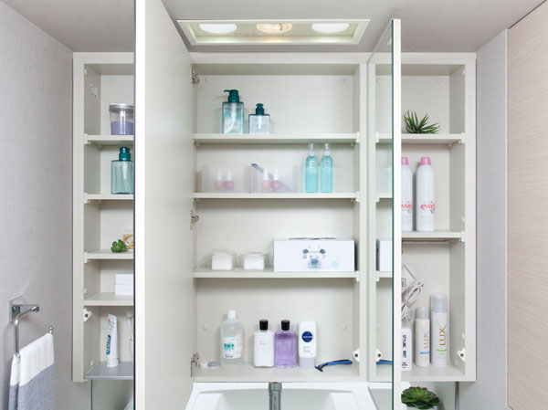 Bathing-wash room.  [Three-sided mirror back storage] With adjustable shelves that tissue box to ensure a just fit the depth of the "three-sided mirror back storage".